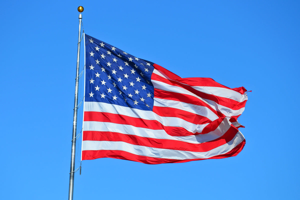 The National Colors Of The United States Are Flown Before The