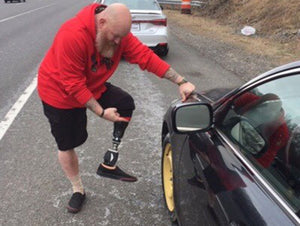 U.S. Veteran Assists General Colin Powell with Flat Tire